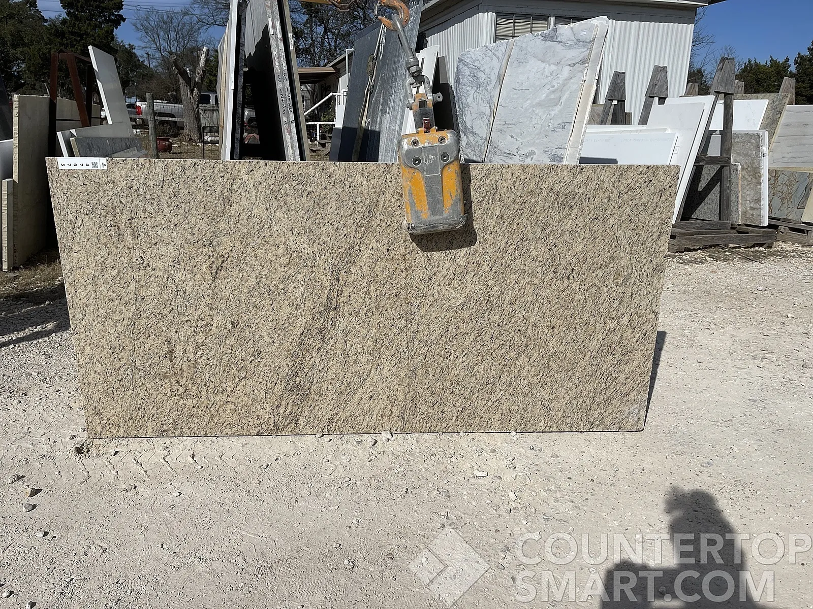 Full image of Giallo Ornamental Brown Granite countertop slab