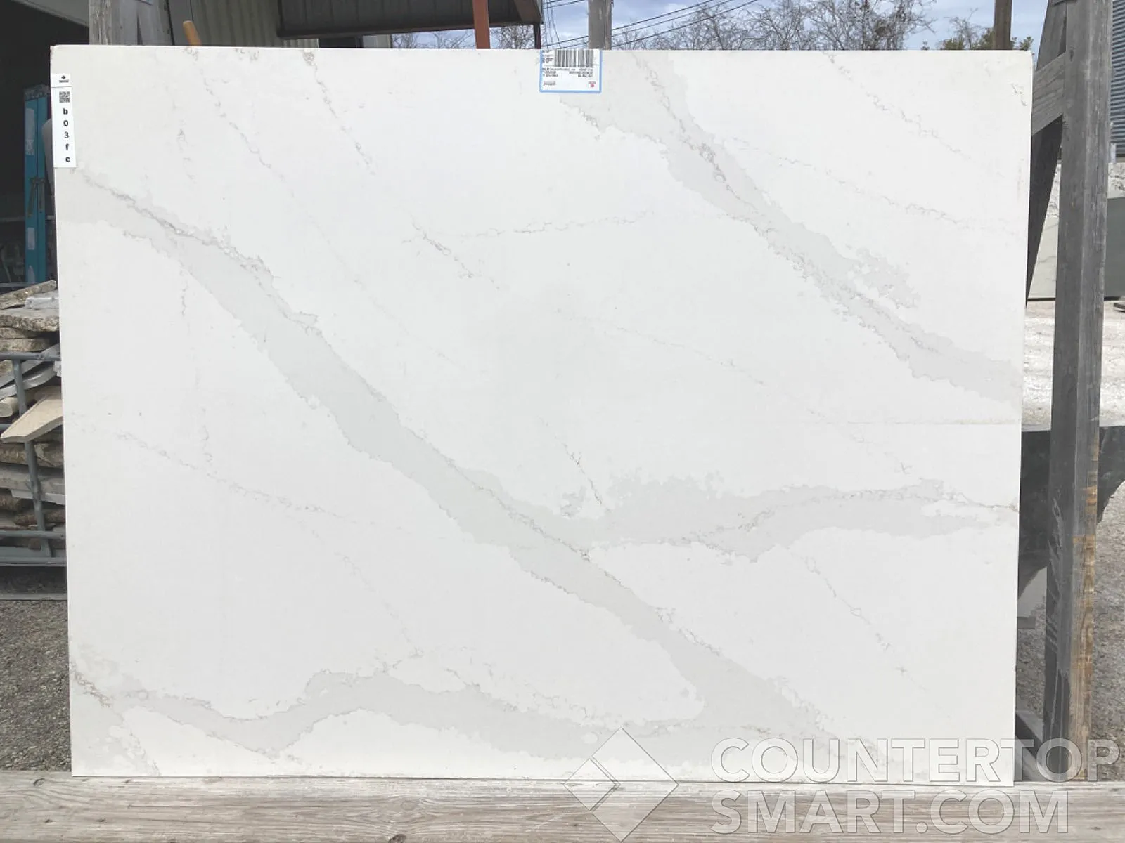 Full image of Silestone Eternal Calacatta Gold White Quartz countertop slab