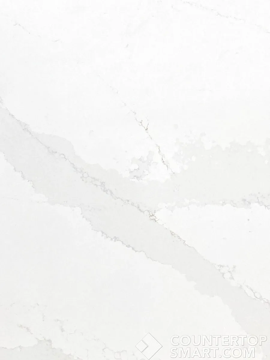 Closeup image of Silestone Eternal Calacatta Gold White Quartz countertop slab