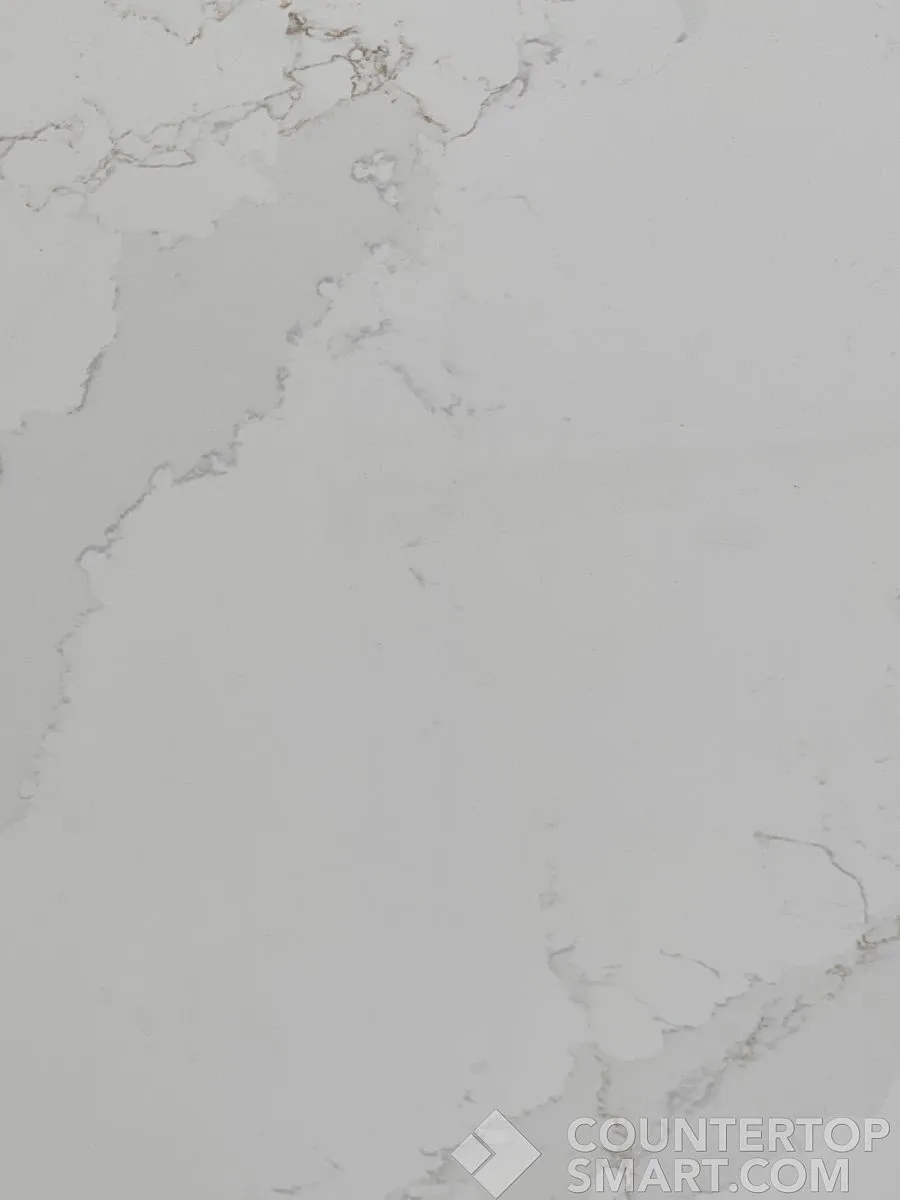 Closeup image of Silestone Eternal Calacatta Gold White Quartz countertop slab