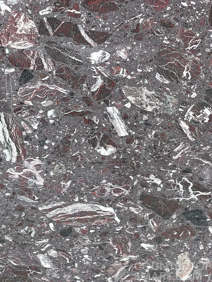 Closeup image of Cherry Mist Grey Glass Terrazzo countertop slab