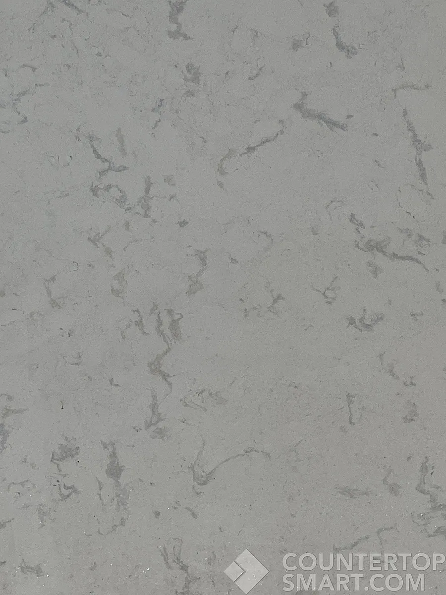 Closeup image of Q Quartz Calacatta Vicenza Quartz countertop slab