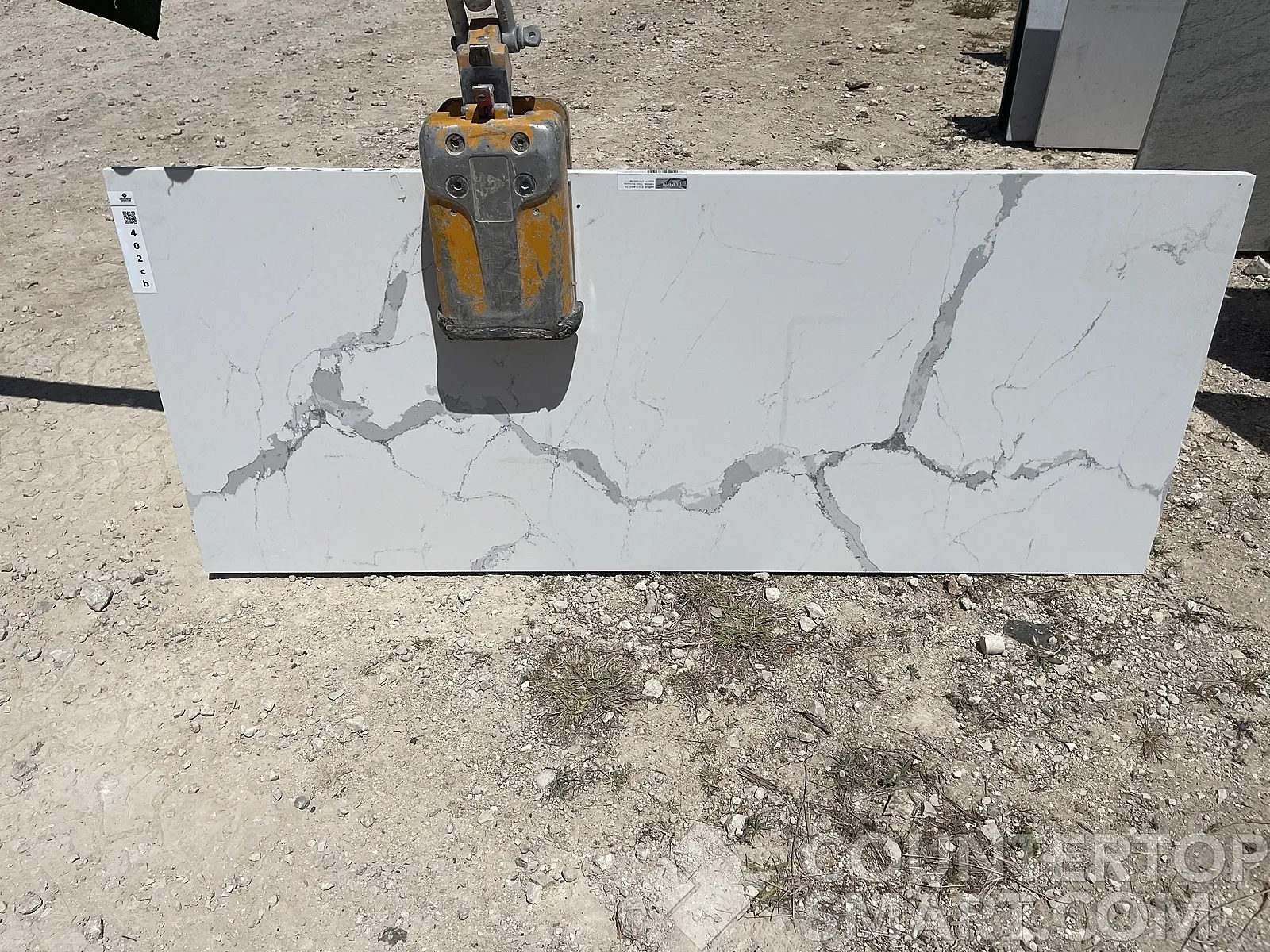 Full image of Compac Unique Statuario Quartz countertop slab