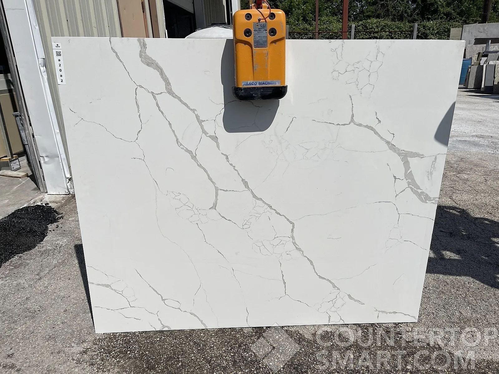Full image of Q Quartz Calacatta Laza Quartz countertop slab