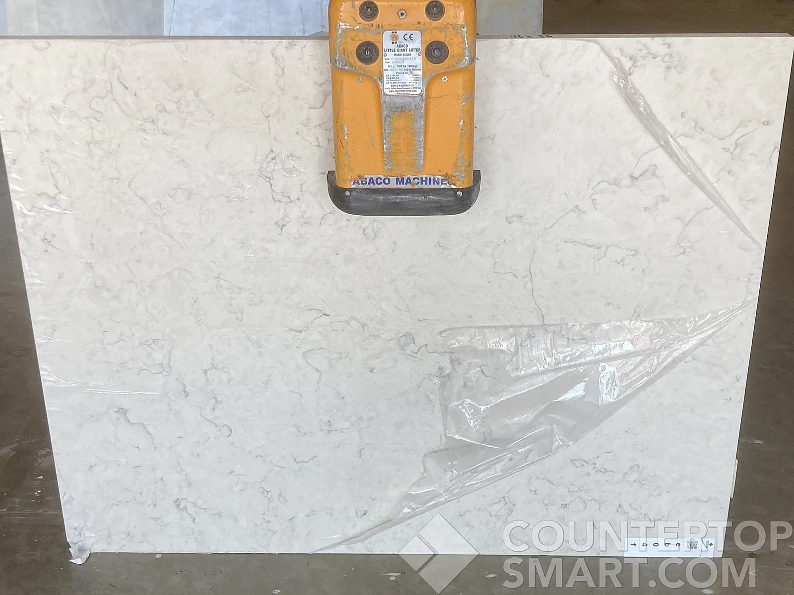 Full image of Q Quartz Carrara Mist Cream Quartz countertop slab