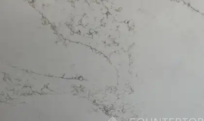 Closeup image of Stratus Quartz Statuario Gold Quartz countertop slab