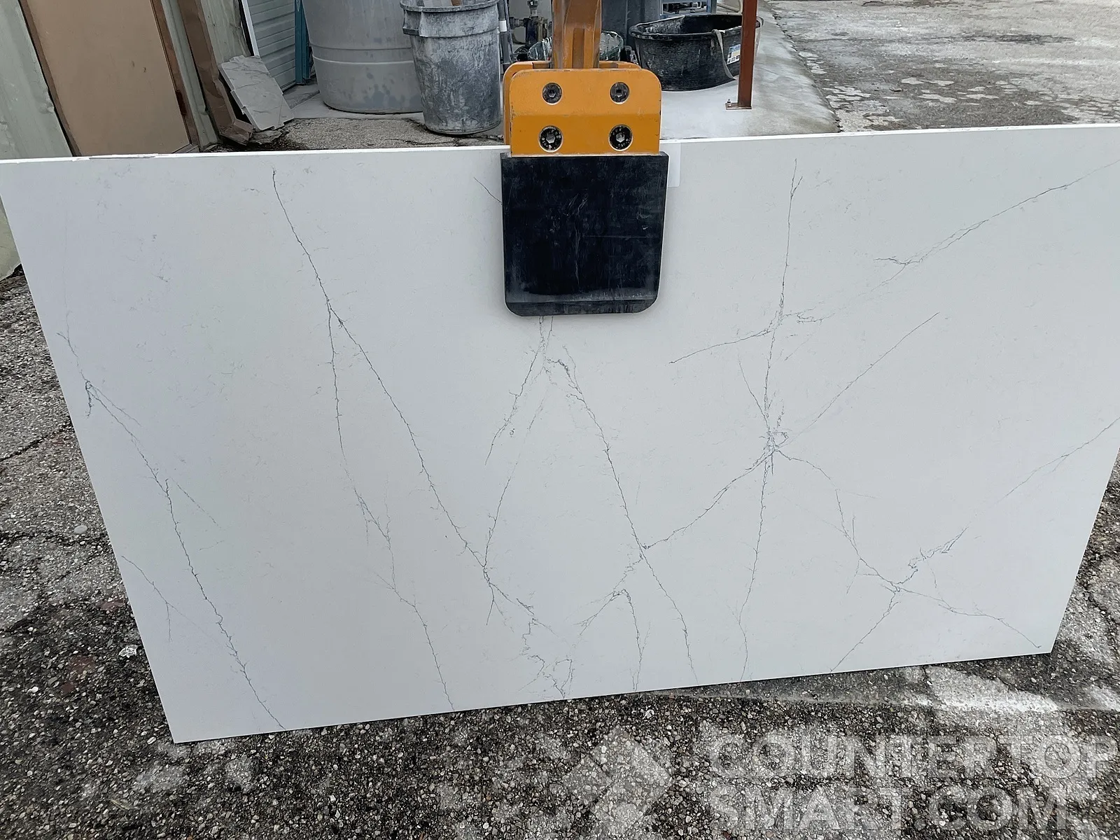 Full image of Q Quartz Calacatta Montage Quartz countertop slab