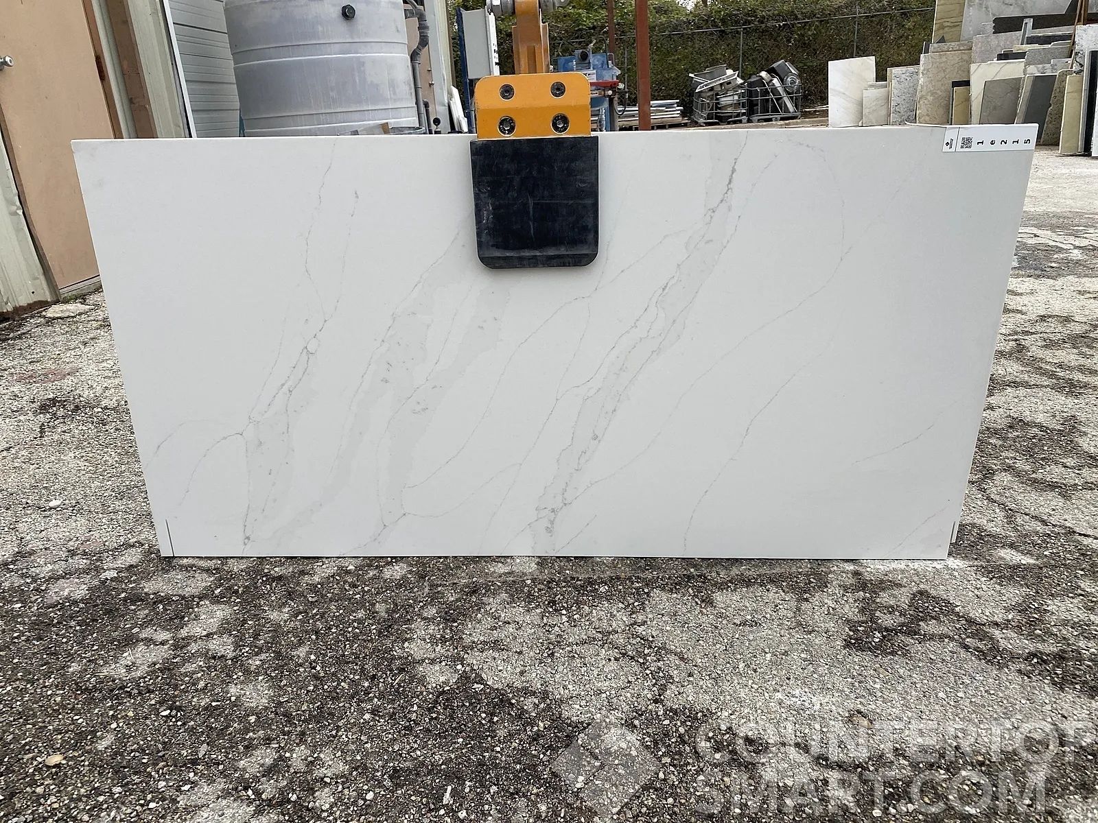 Full image of MetroQuartz Unique Calacatta Quartz countertop slab