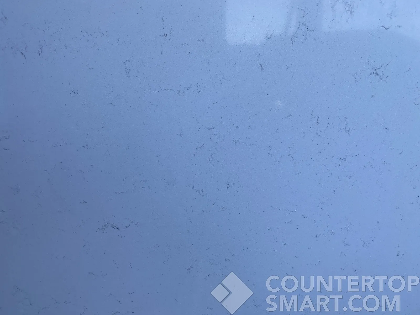 Closeup image of Stratus Quartz Serene Carrara White Quartz countertop slab