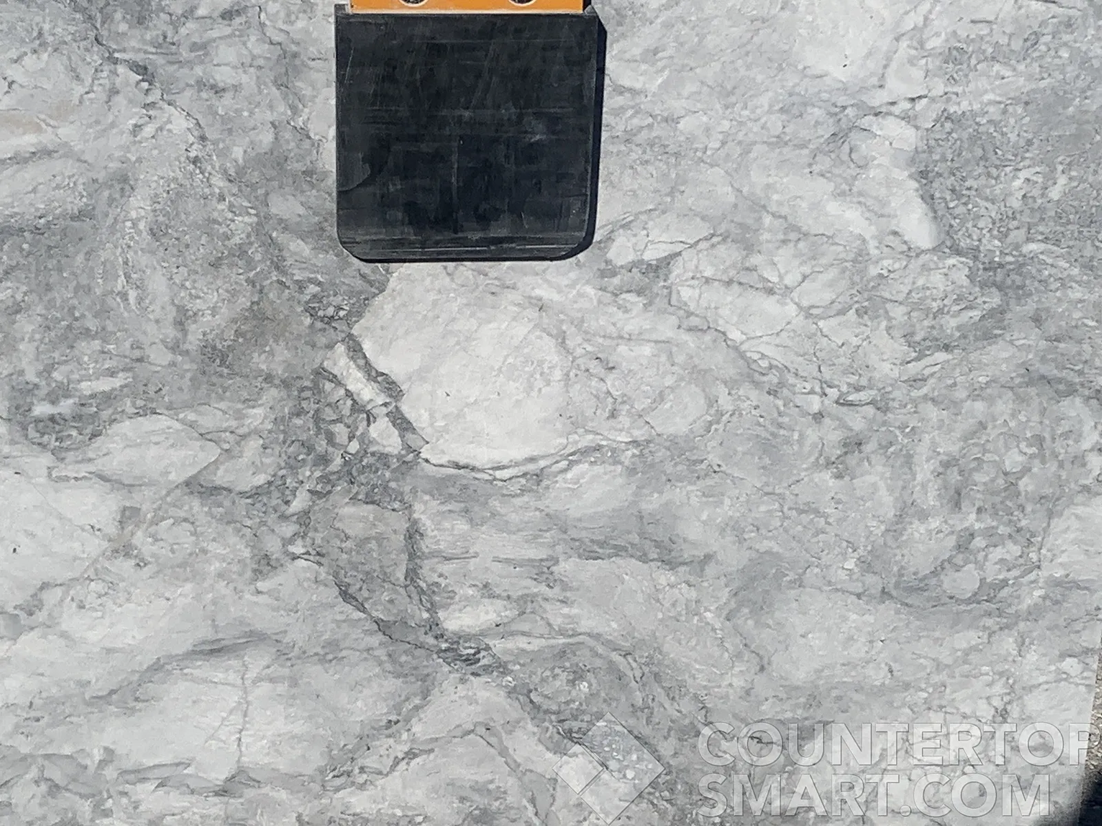 Closeup image of Grey Goose Marble countertop slab