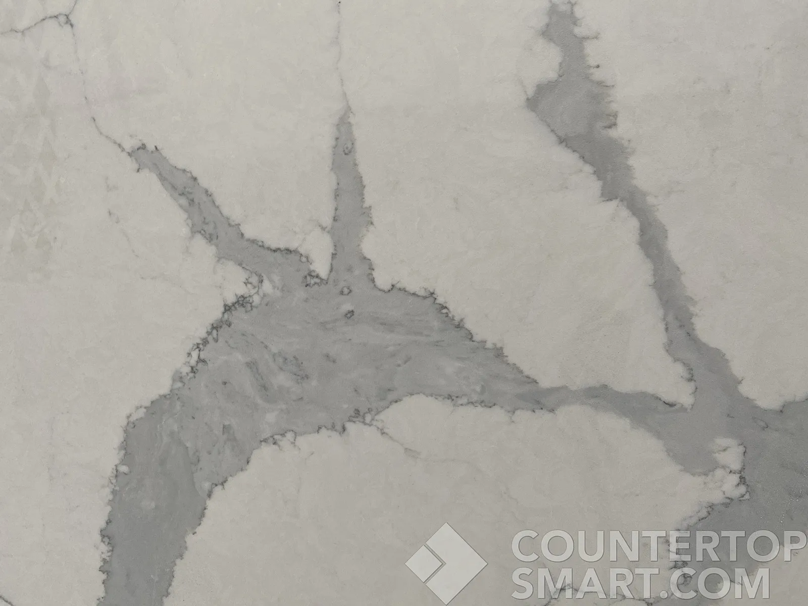 Closeup image of Stratus Quartz Calacatta Capri White Quartz countertop slab