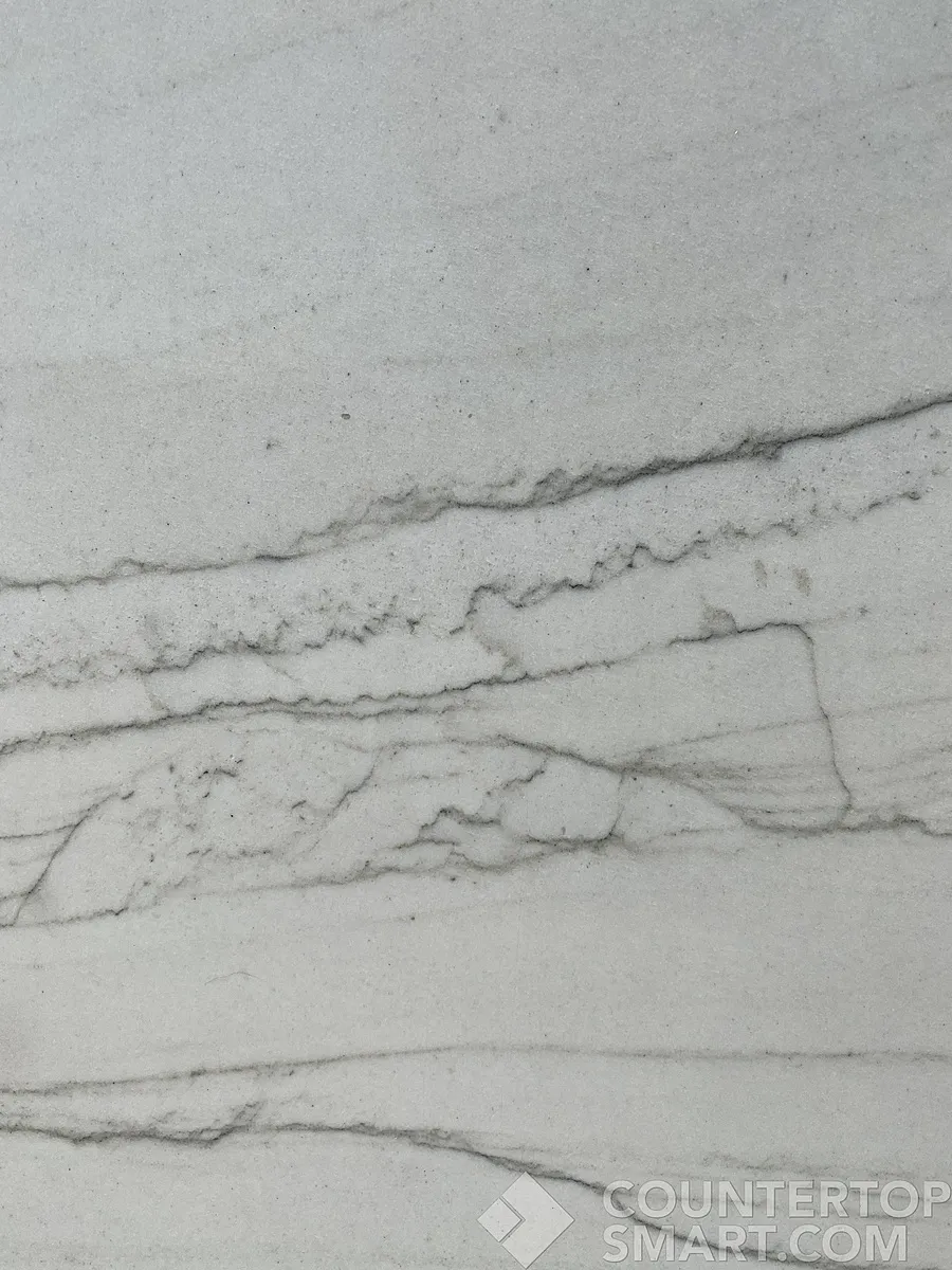 Closeup image of Luce Di Luna Quartzite countertop slab