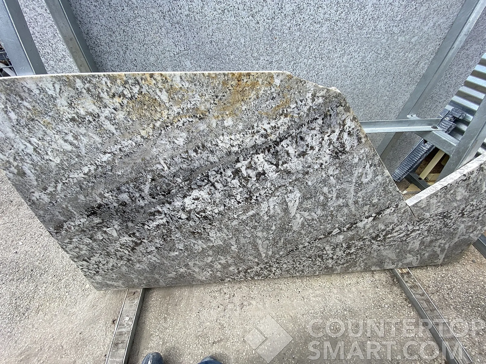 Full image of Antico Silver Cream Granite countertop slab