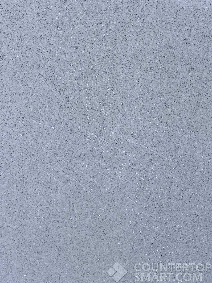 Closeup image of Della Terra Dusk Quartz countertop slab