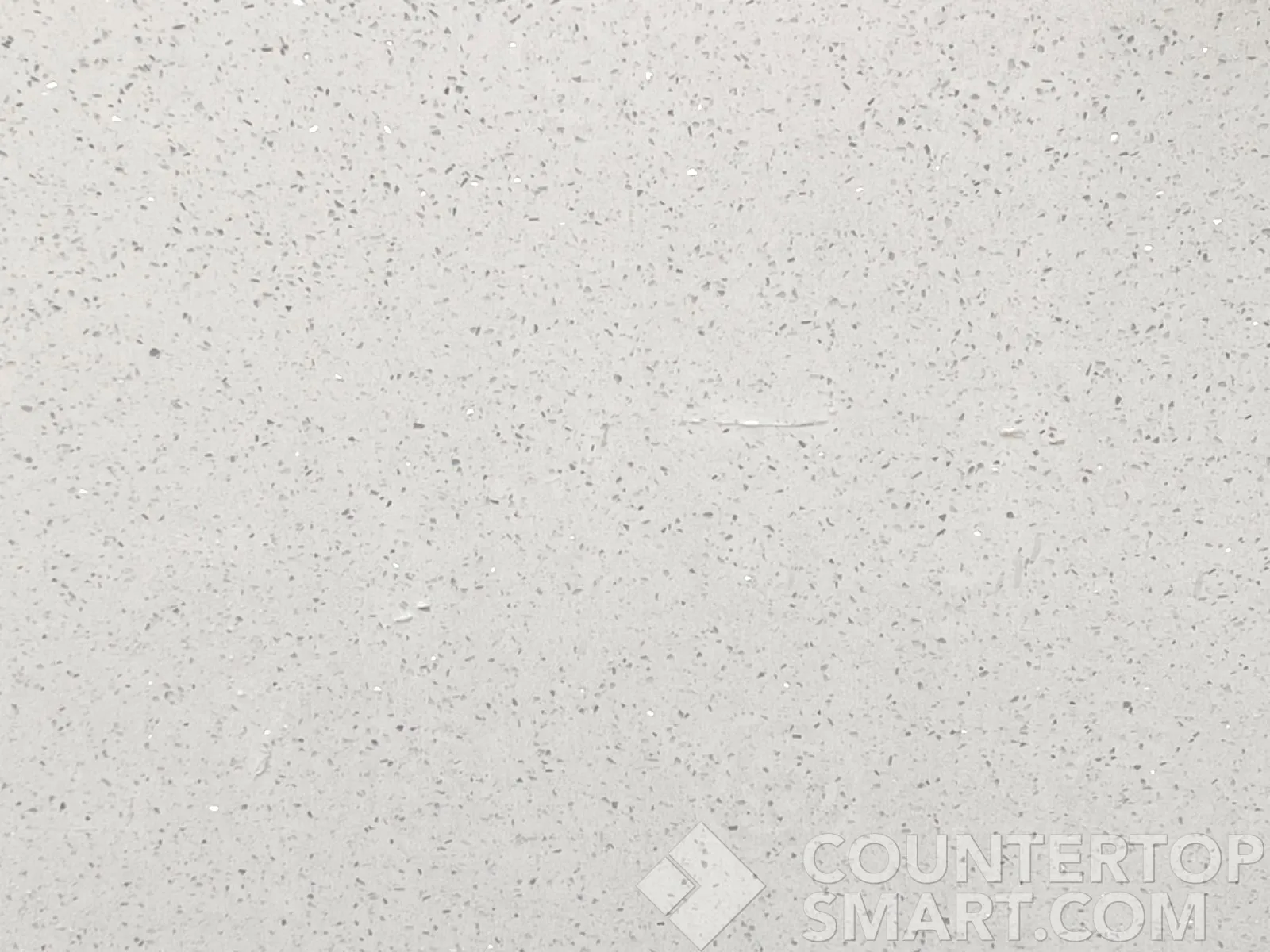 Closeup image of Stratus Quartz Icy Speckle White Quartz countertop slab