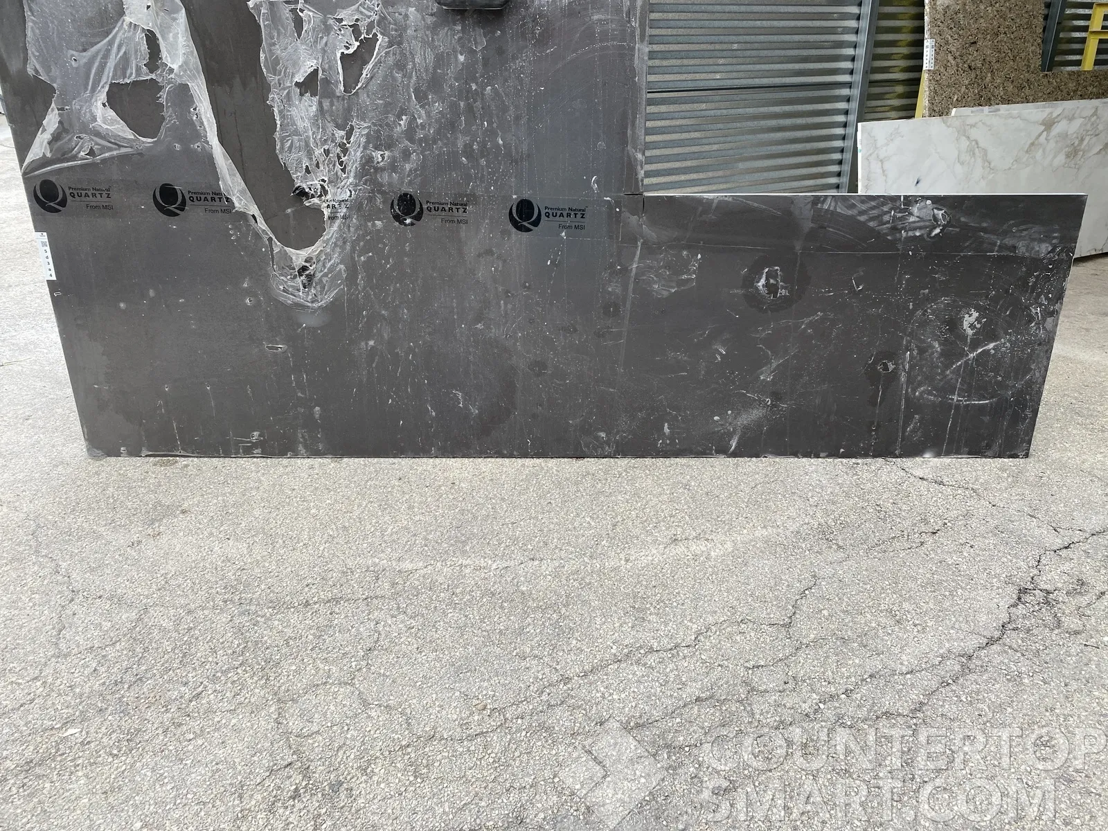 Full image of Q Quartz Manhattan Grey Quartz countertop slab