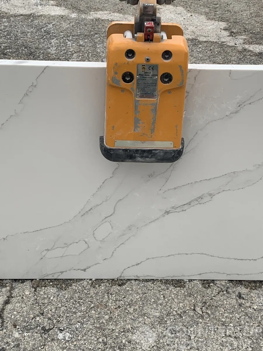 Closeup image of Q Quartz Calacatta Izaro White Quartz countertop slab