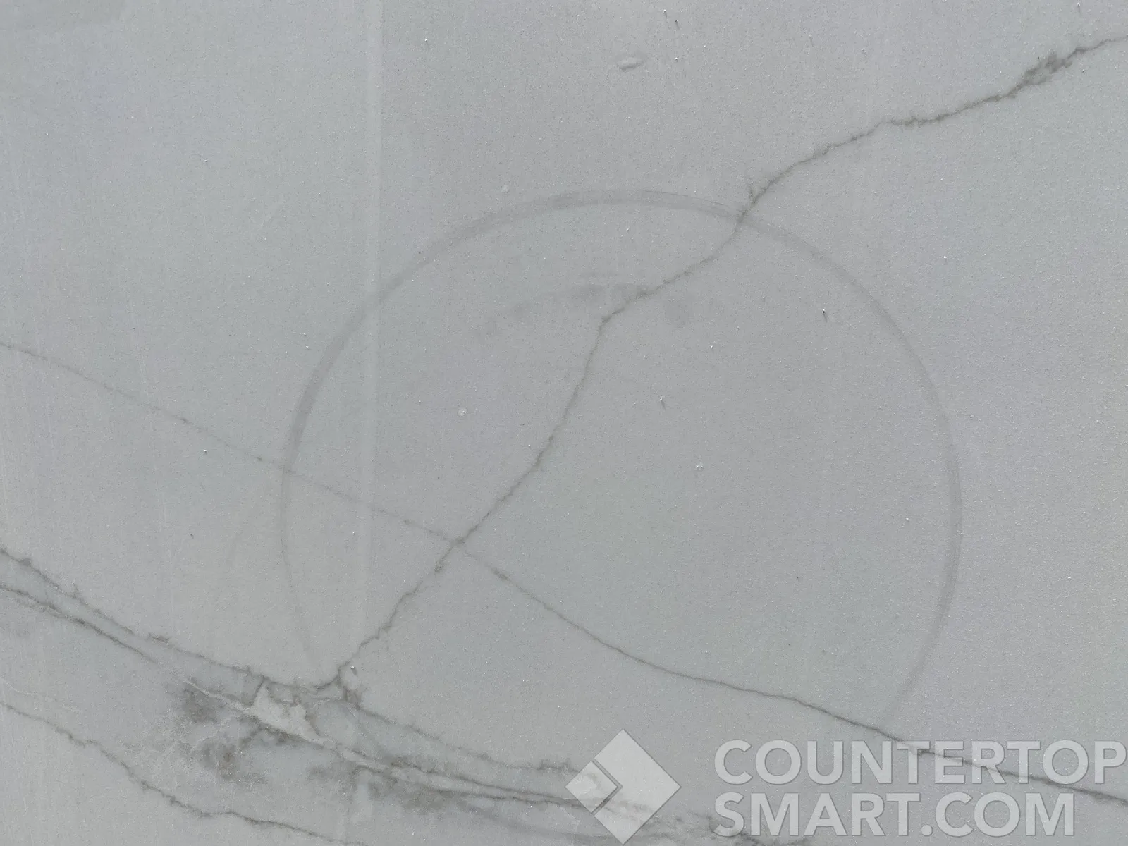 Closeup image of Q Quartz Calacatta Izaro White Quartz countertop slab