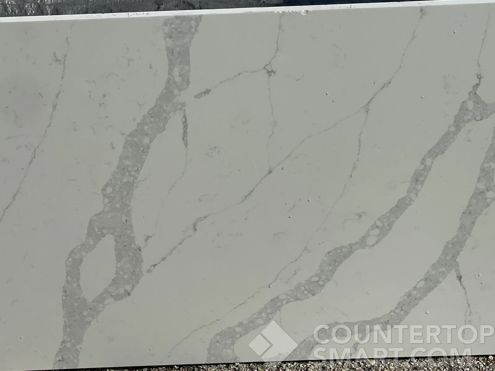 Closeup image of Stratus Quartz Calacatta Elegance White Quartz countertop slab
