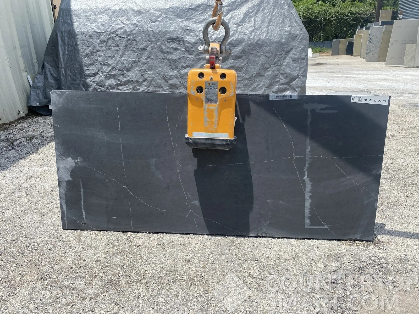 Full image of Daltile Broadway Black Black Quartz countertop slab