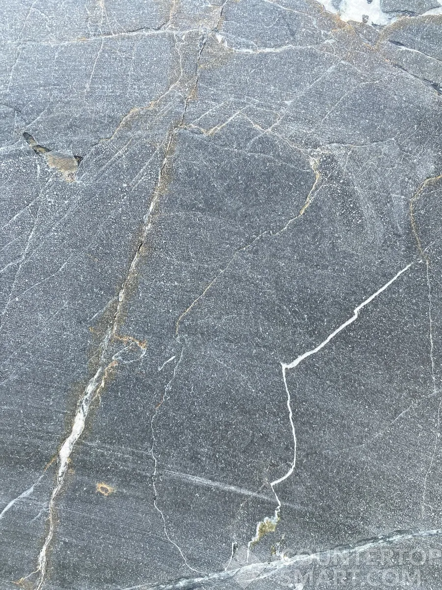 Closeup image of Infinity Leather Grey Granite countertop slab