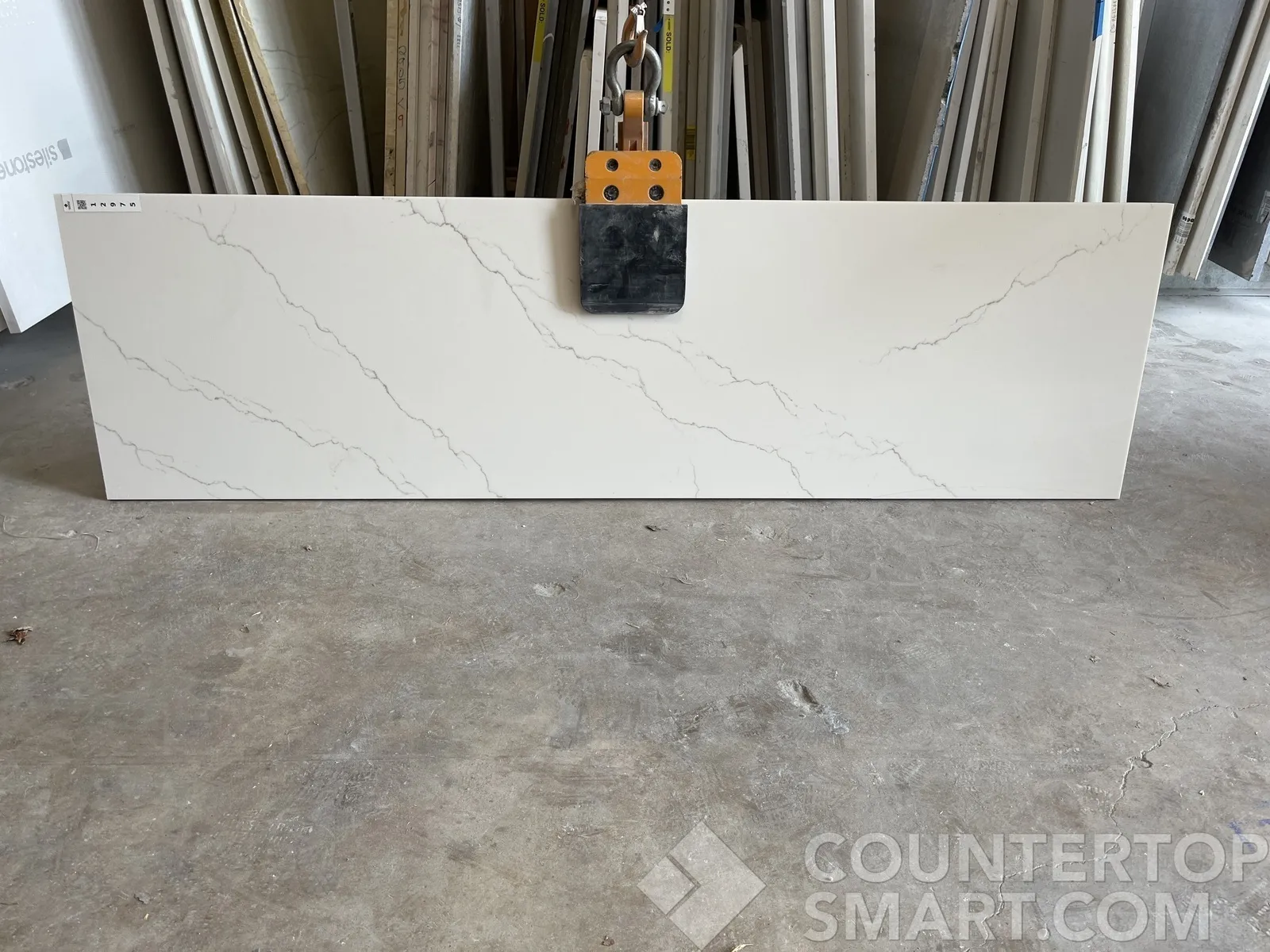 Full image of Q Quartz Calacatta Miraggio Gold Quartz countertop slab