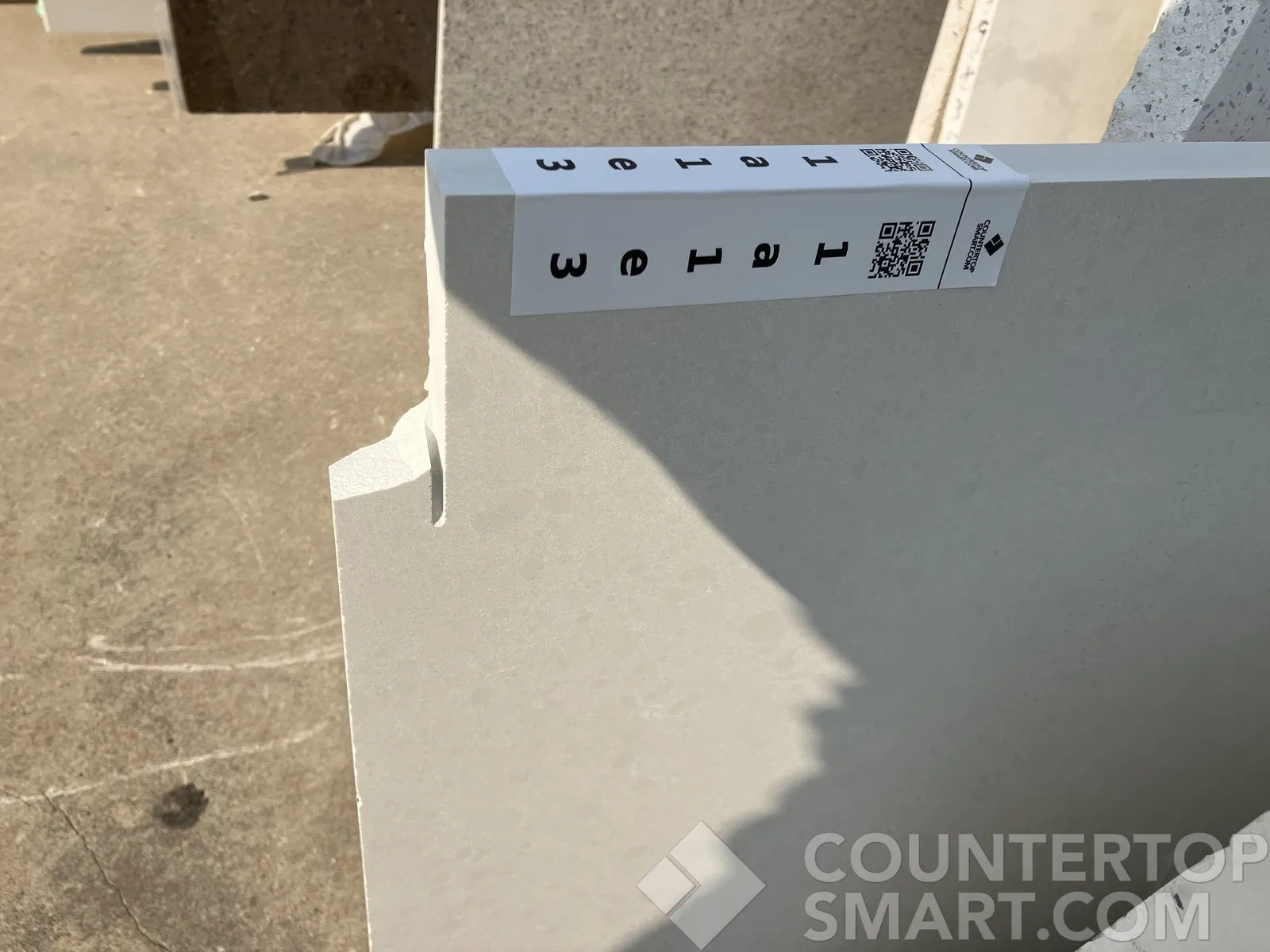 Full image of Q Quartz Frost White Quartz countertop slab