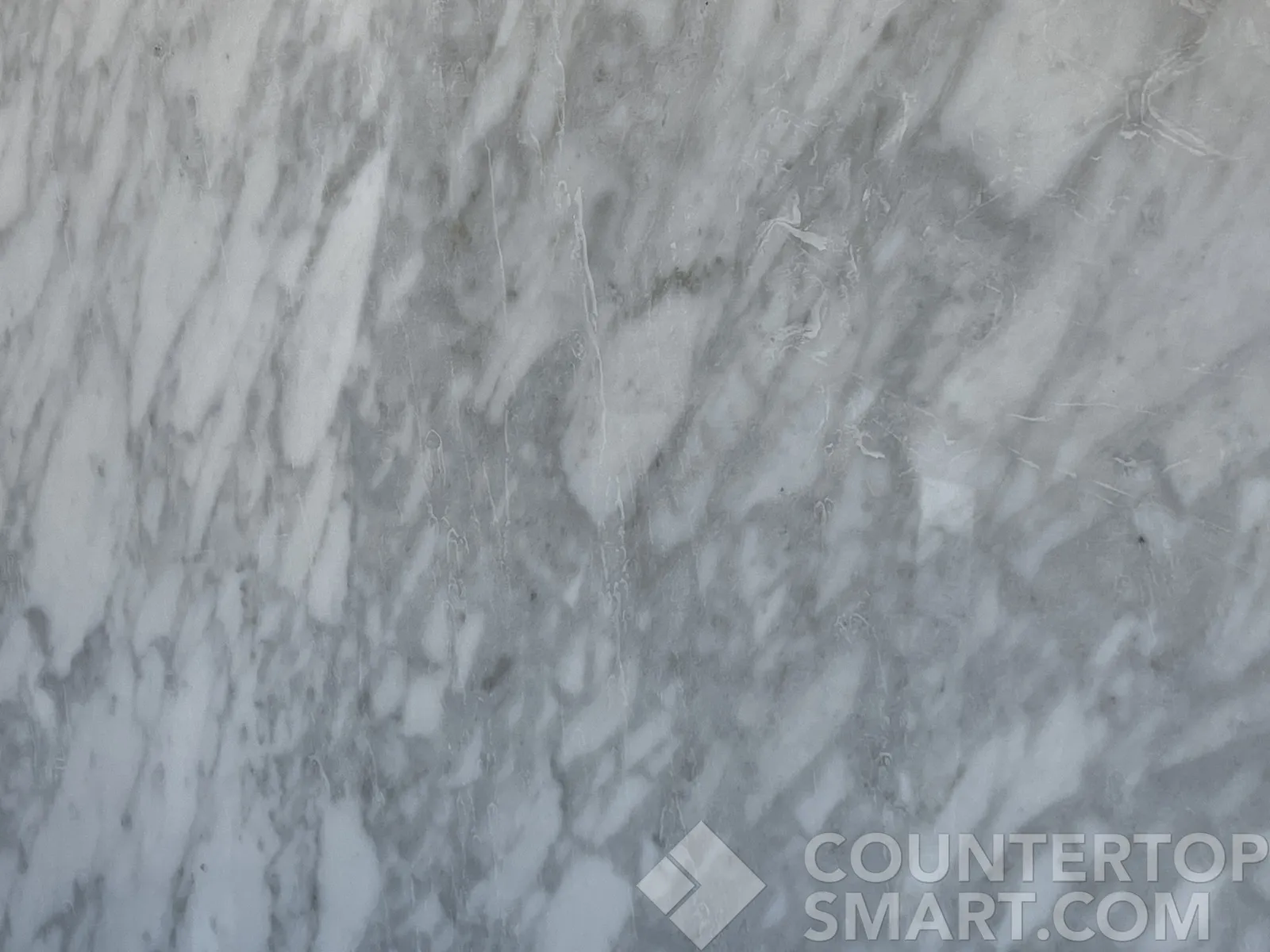 Closeup image of Carrara Marble countertop slab