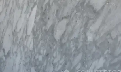 Closeup image of Carrara Marble countertop slab