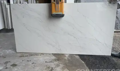 Full image of CRS Quartz Calacatta Marvel Quartz countertop slab