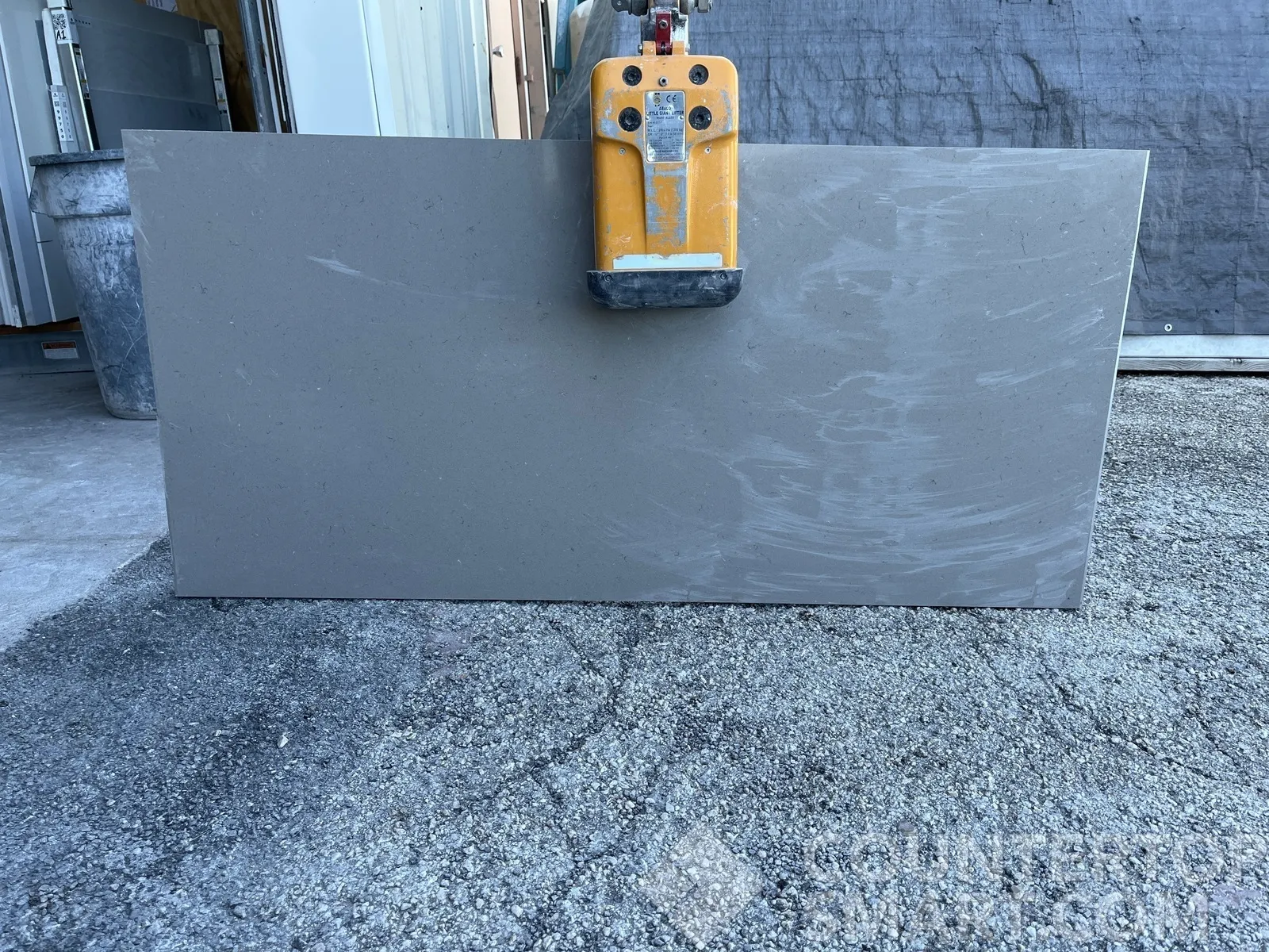 Full image of Q Quartz Fossil Gray Quartz countertop slab