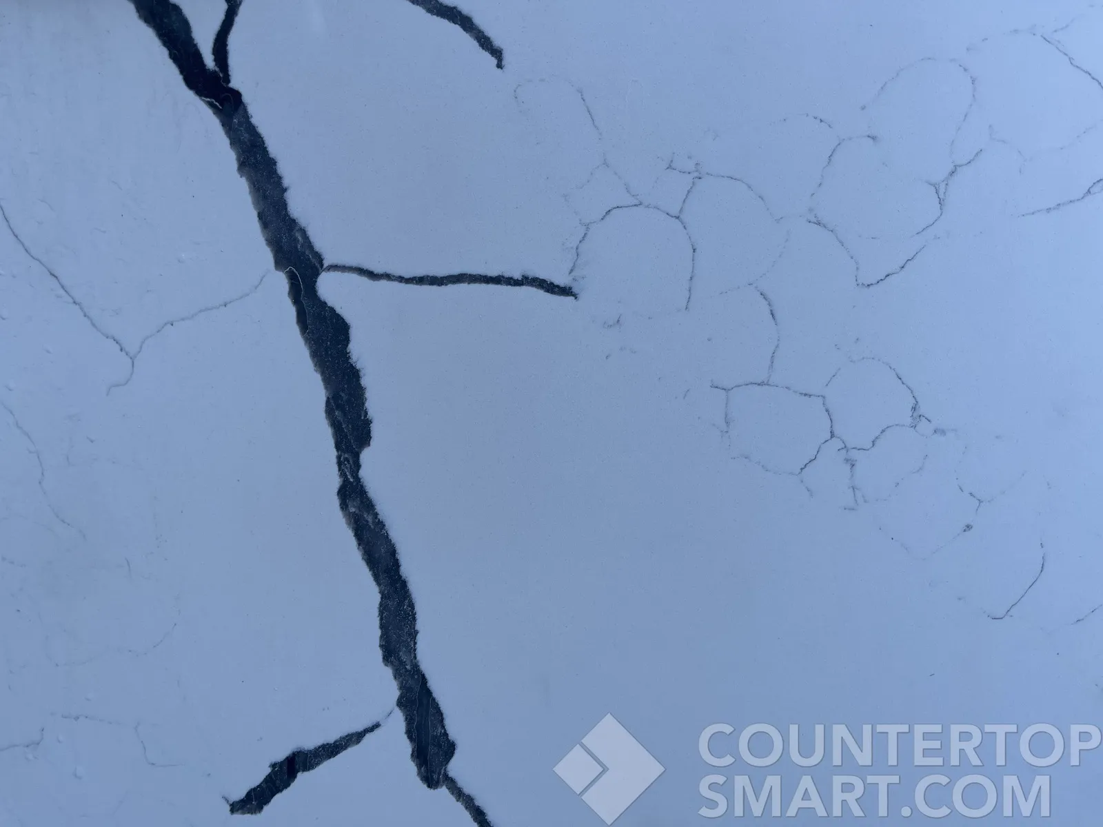 Closeup image of Stratus Quartz Calacatta Zeal White Quartz countertop slab