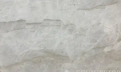Closeup image of Perla Venato White Quartzite countertop slab
