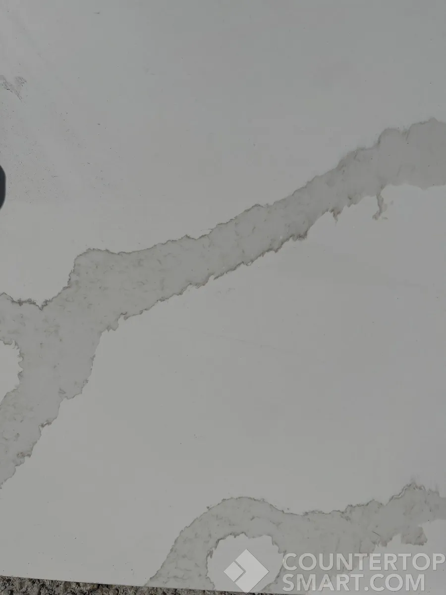 Closeup image of Aggranite Calacatta Tuscany White Quartz countertop slab