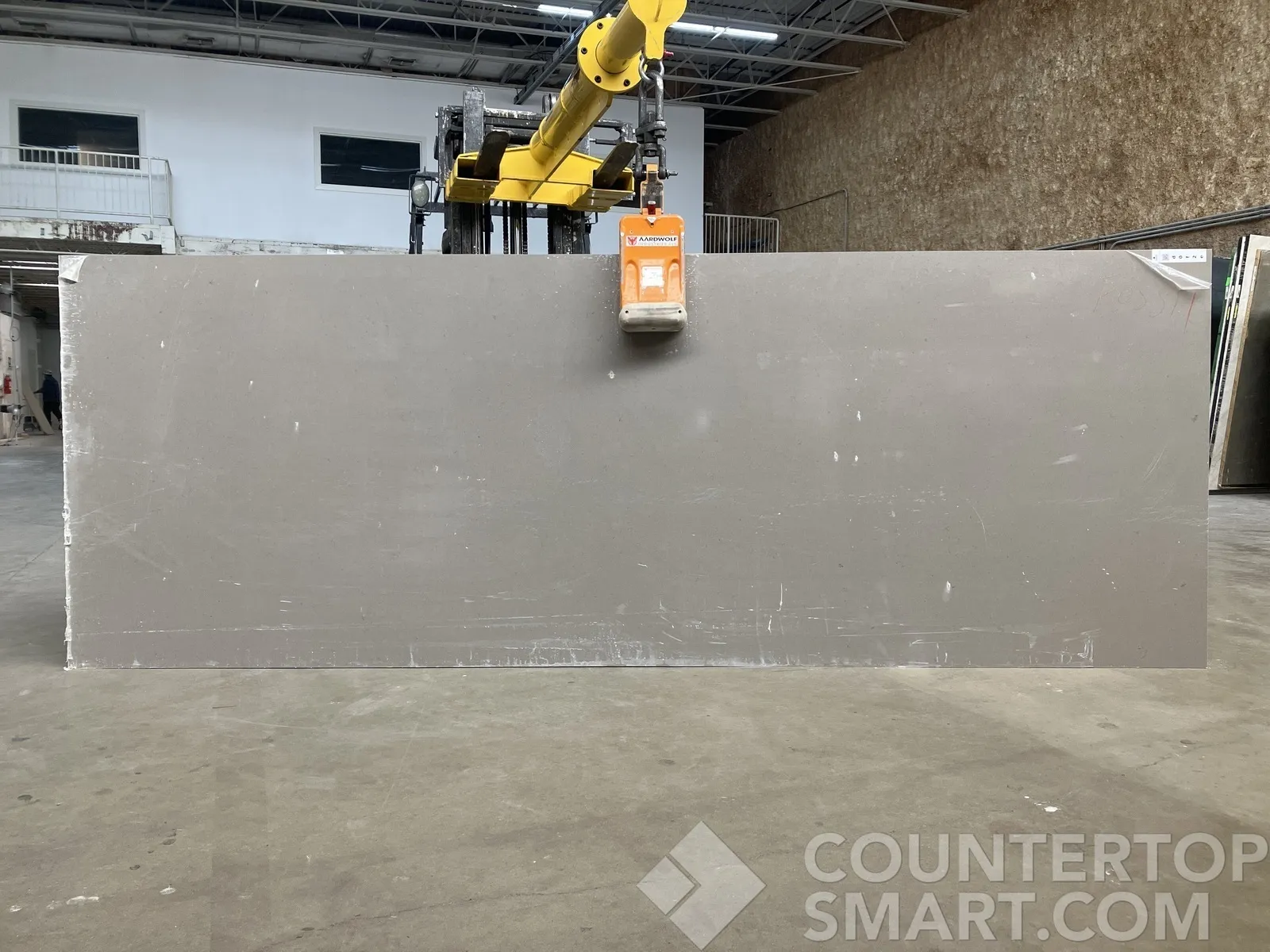 Full image of Q Quartz Fossil Gray Quartz countertop slab