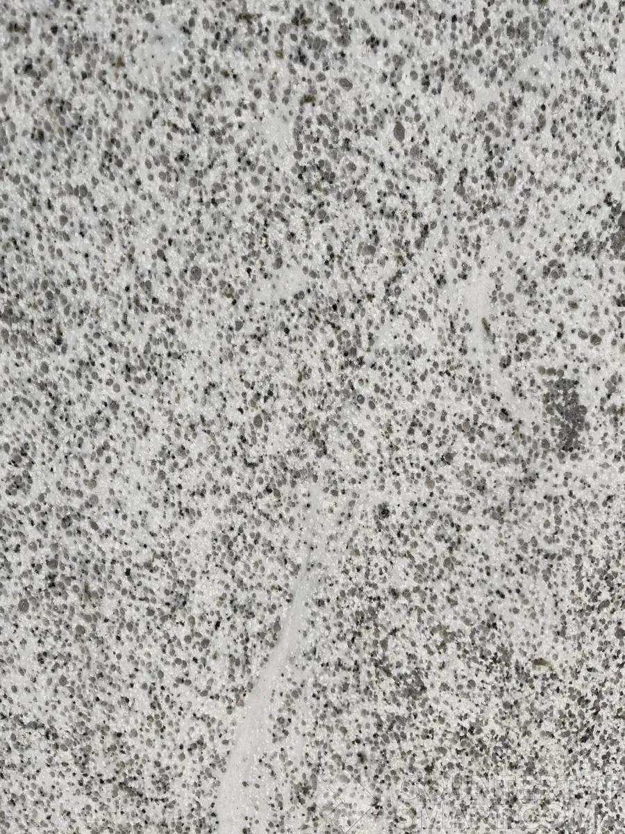 Closeup image of Blanco Real Grey Granite countertop slab