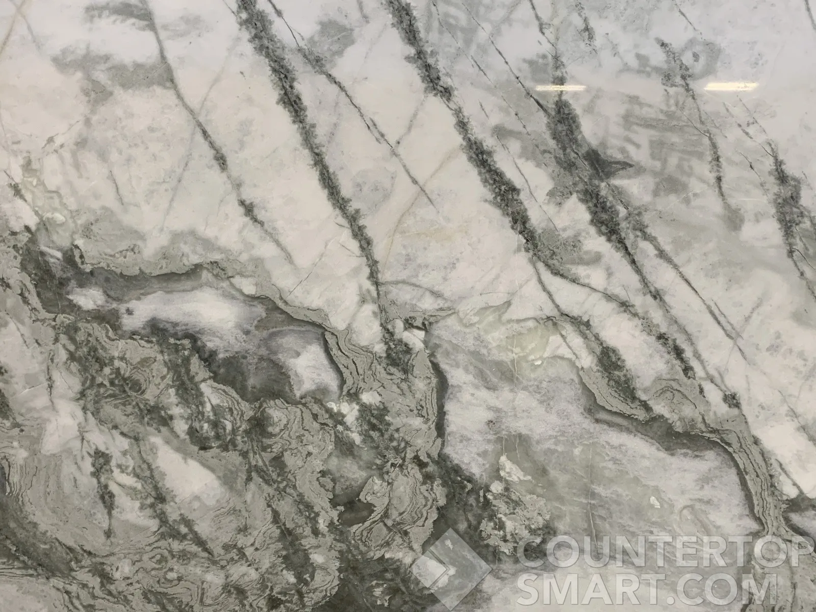 Closeup image of Ice Onyx White Marble countertop slab