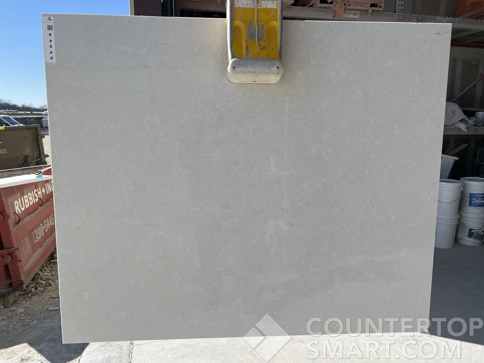Full image of Caesarstone Cosmopolitan White Grey Quartz countertop slab