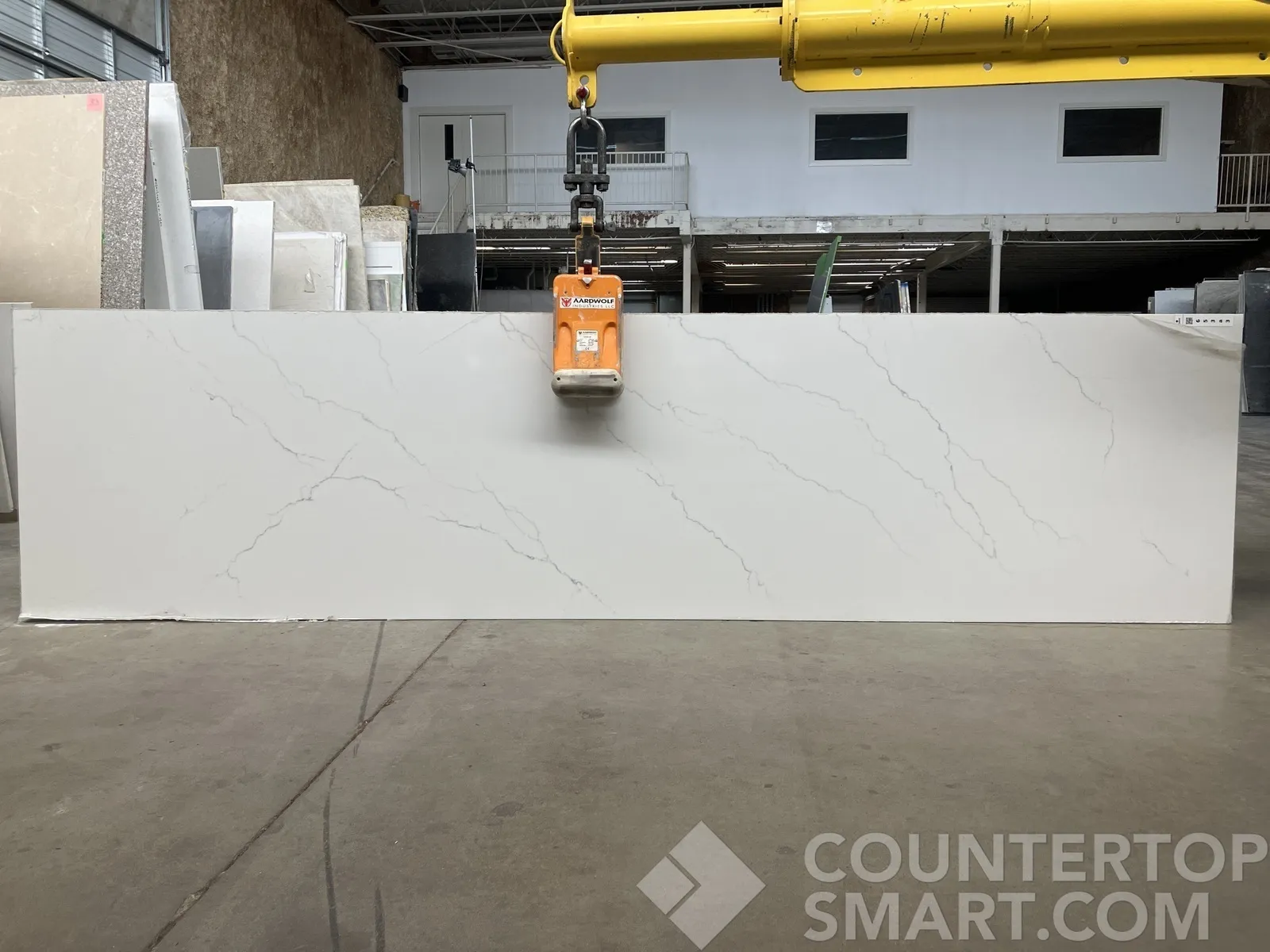 Full image of Q Quartz Calacatta Miraggio Quartz countertop slab