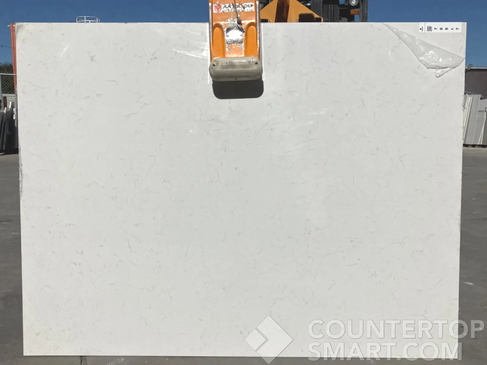 Full image of Q Quartz Carrara Mist Cream Quartz countertop slab