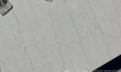 Full image of Q Quartz Calacatta Taj Quartz countertop slab