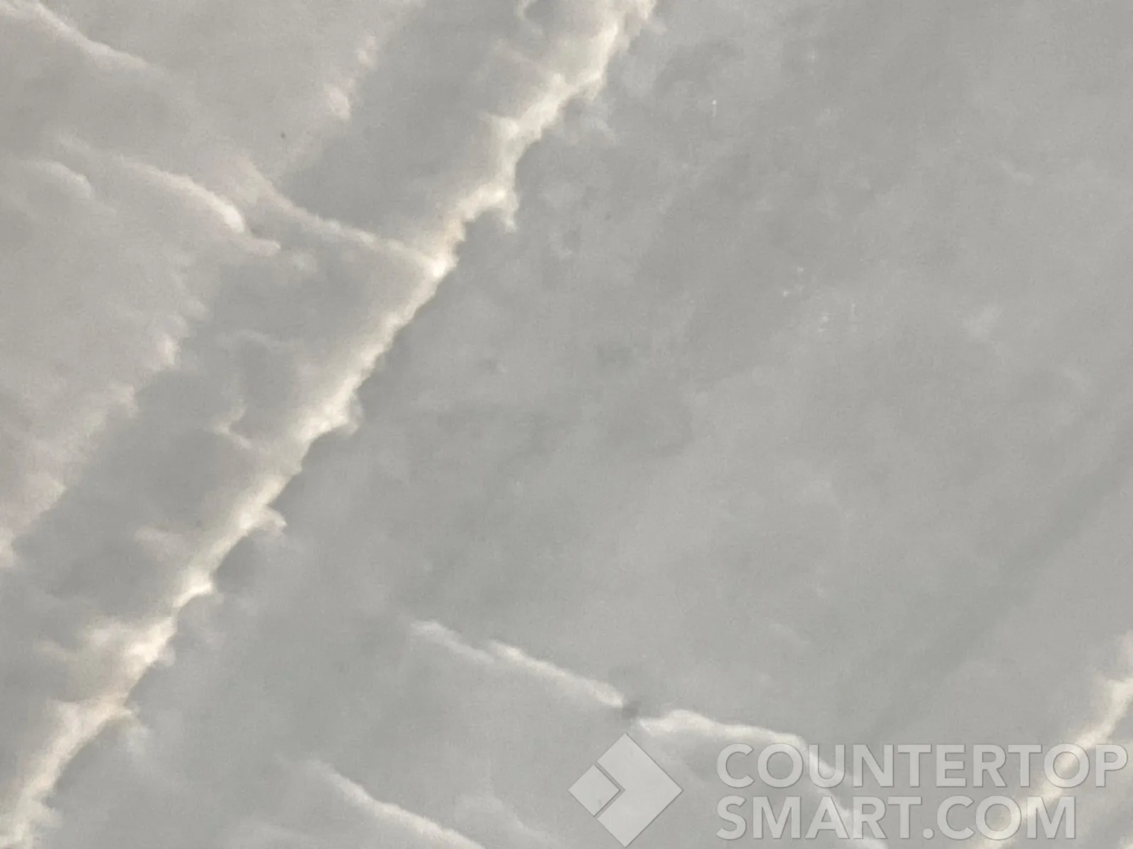Closeup image of Emerald Green Quartzite countertop slab