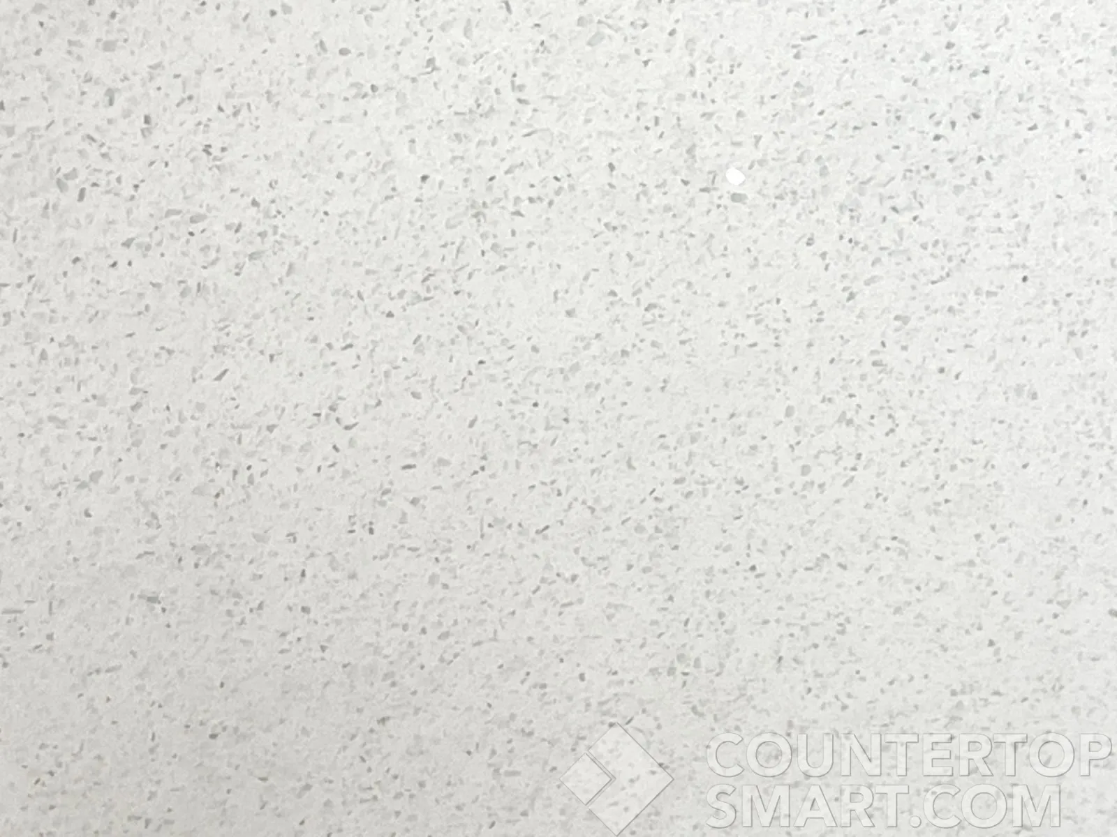 Closeup image of Stratus Quartz Icy Speckle White Quartz countertop slab
