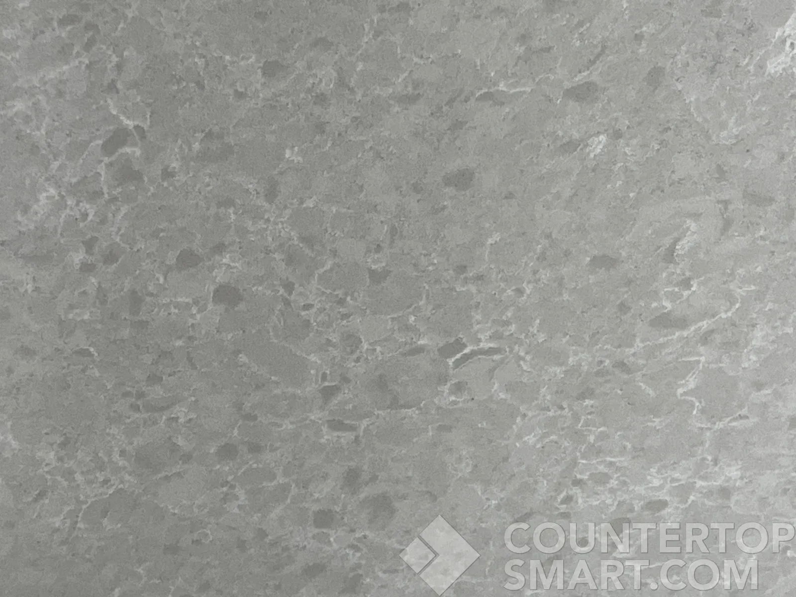 Closeup image of Daltile Heritage Greige Grey Quartz countertop slab