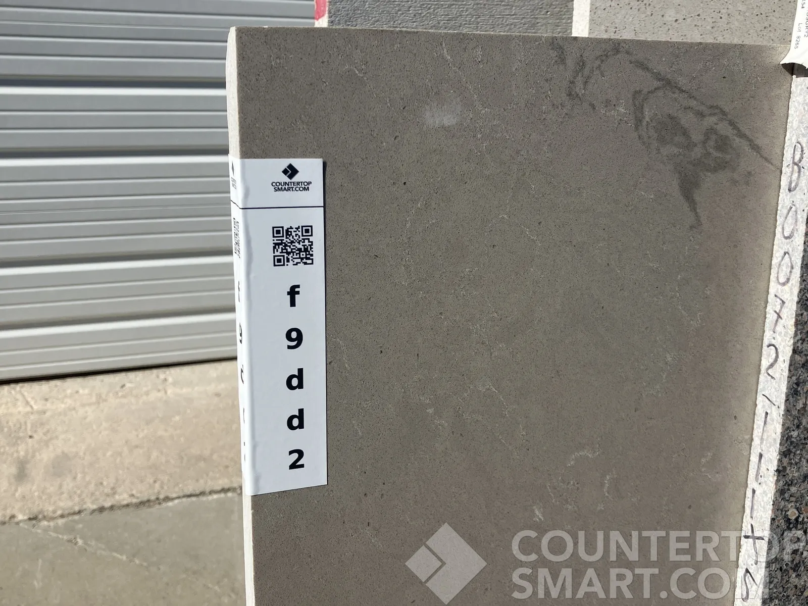 Full image of Daltile Capital Beige Black Quartz countertop slab