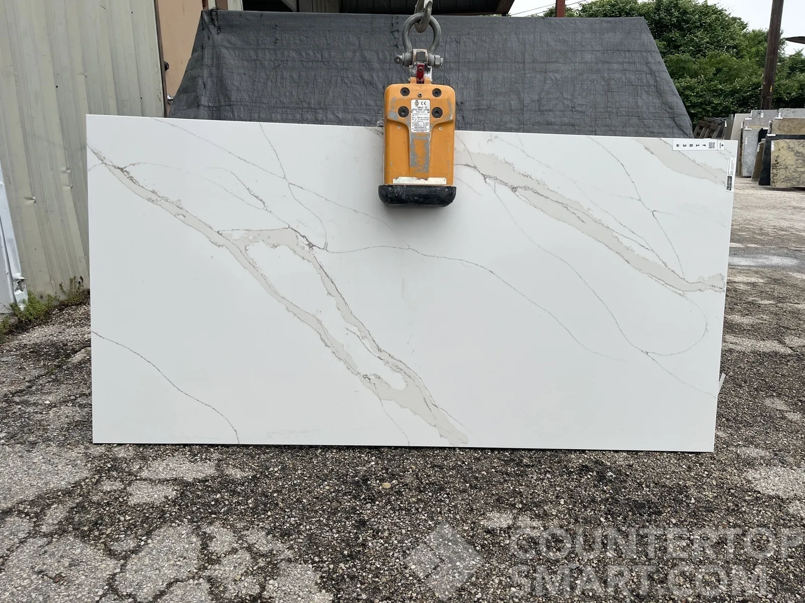 Full image of Compac Unique Calacatta Gold Quartz countertop slab
