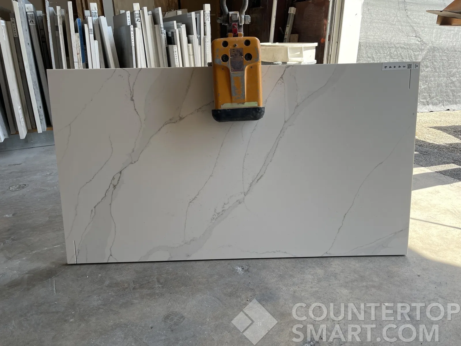 Full image of Compac Unique Calacatta Gold Quartz countertop slab