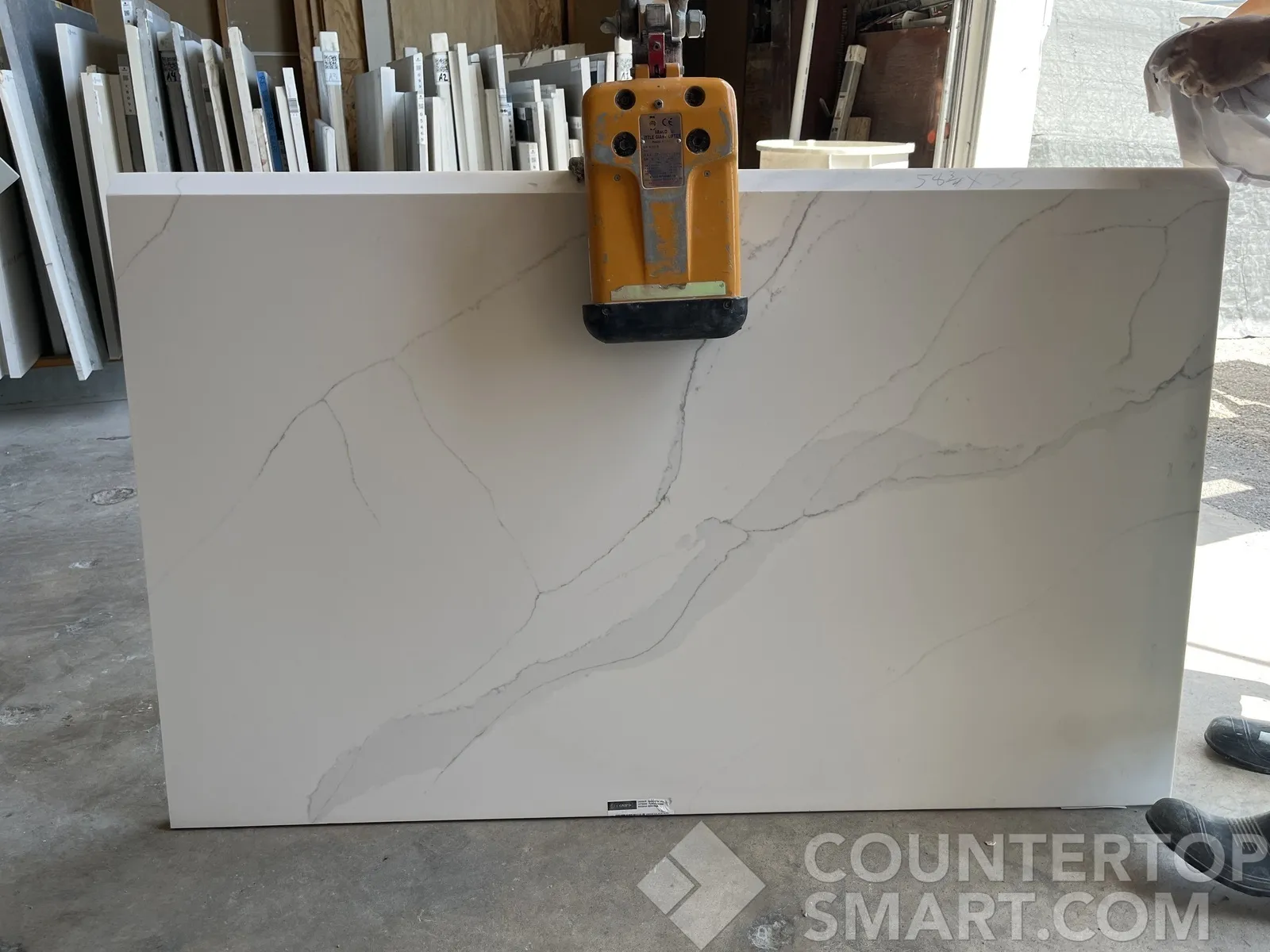 Full image of Compac Unique Calacatta Gold Quartz countertop slab