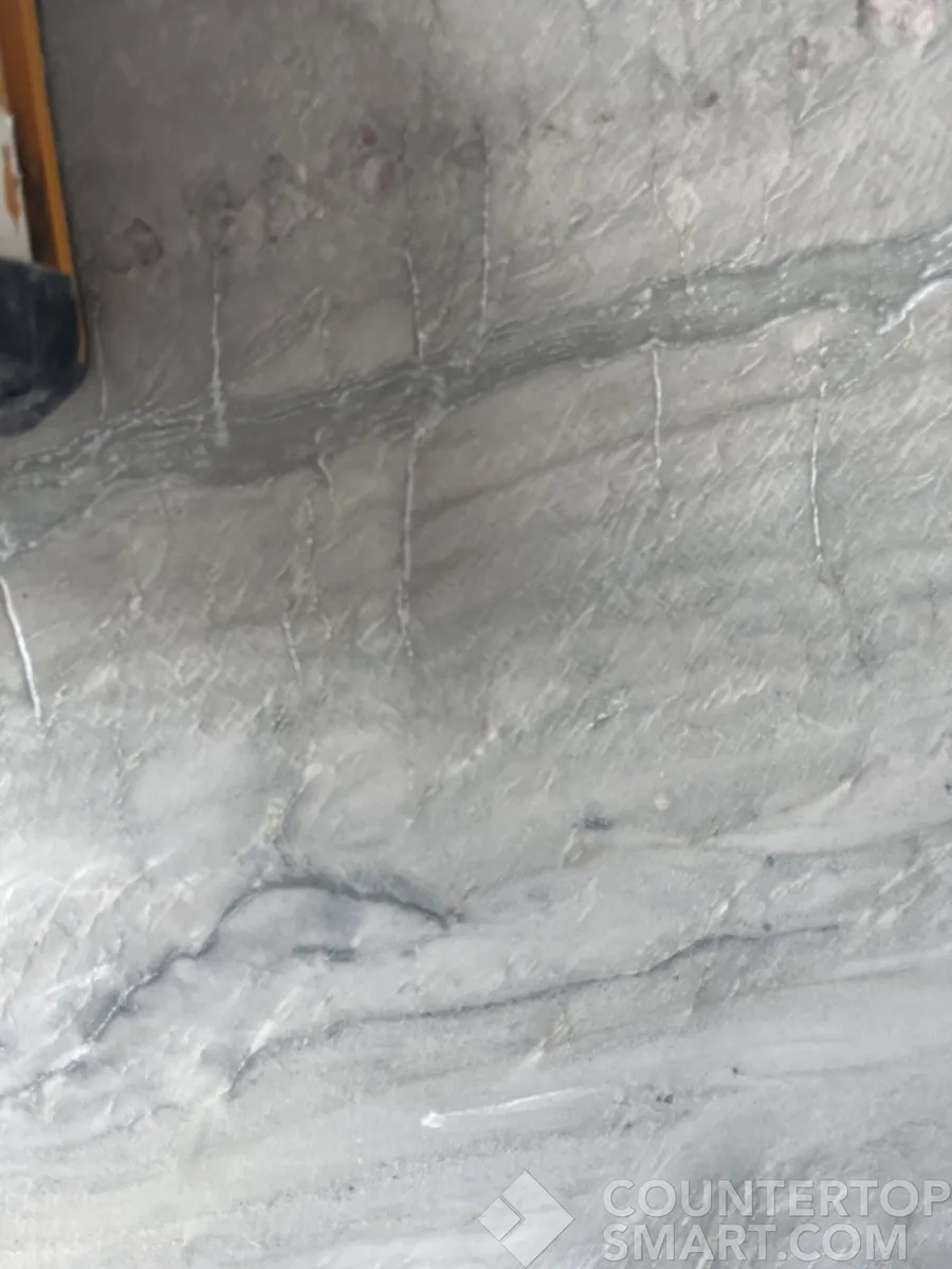 Closeup image of Leblon Premium Cream Quartzite countertop slab