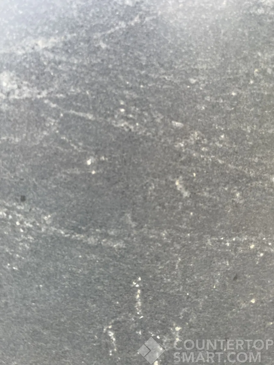 Closeup image of Virginia Black Honed Black Granite countertop slab